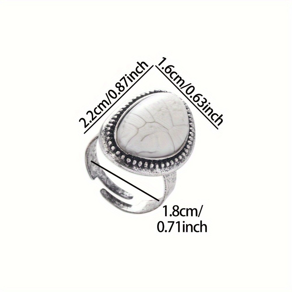 טבעת נירוסטה יחידה מהקולקציה, הכוללת טבעת אליפסה זהובה לבנה, ססגונית טבעית, משובצת בצבע לבן פנינה ושרף, אביזרים יוקרתיים בסגנון וינטג' צרפתי. העיצוב הפתוח מתכוונן ואינו דוהה, עם עיצוב פשוט ומעודן בשני סגנונות. - Image 4