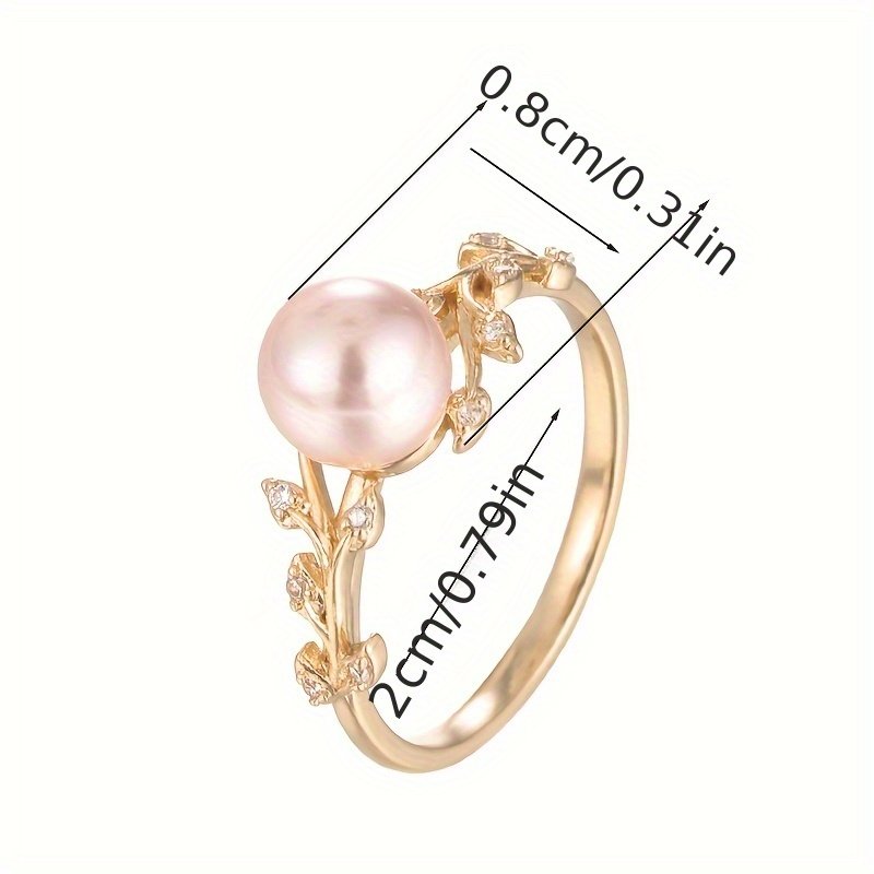 ⁦טבעת אלגנטית בעיצוב ענף זית ועלה עם זירקוניה מעוקבת ופנינה מלאכותית, מצופה נחושת K לבן - מושלמת לענידה יומיומית או מתנה⁩ – תמונה ⁦6⁩