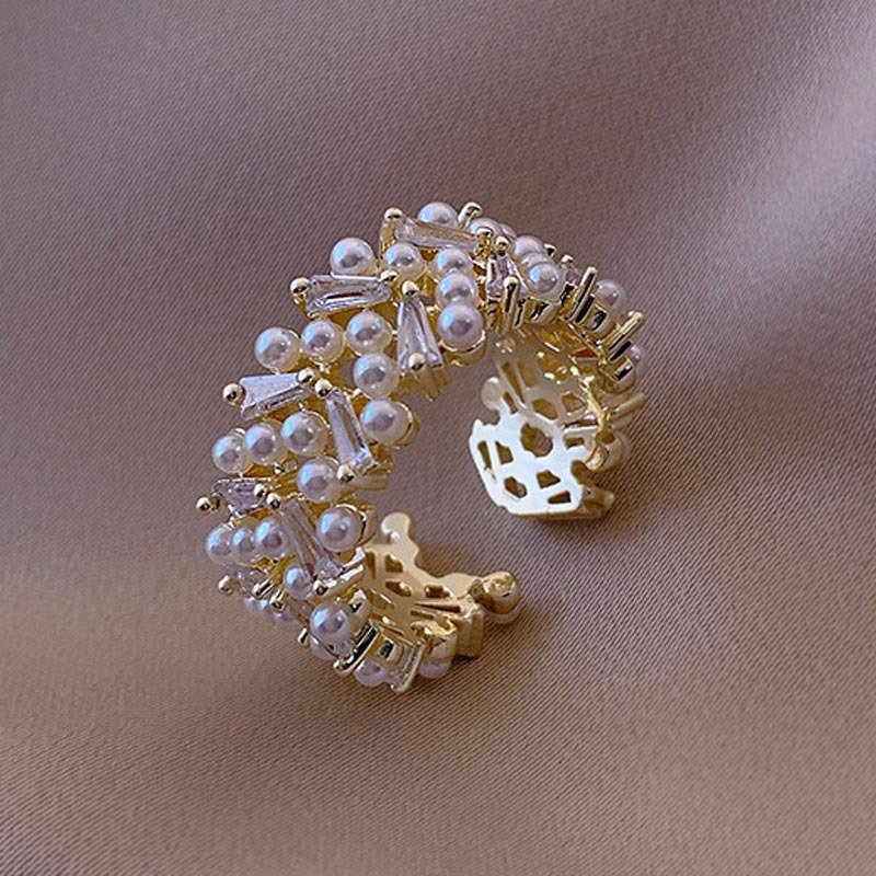 טבעת אינדקס עיצוב נישה לאישה בסגנון רוח קרה בדרגה גבוהה עם פתיחת עלי זירקוניה